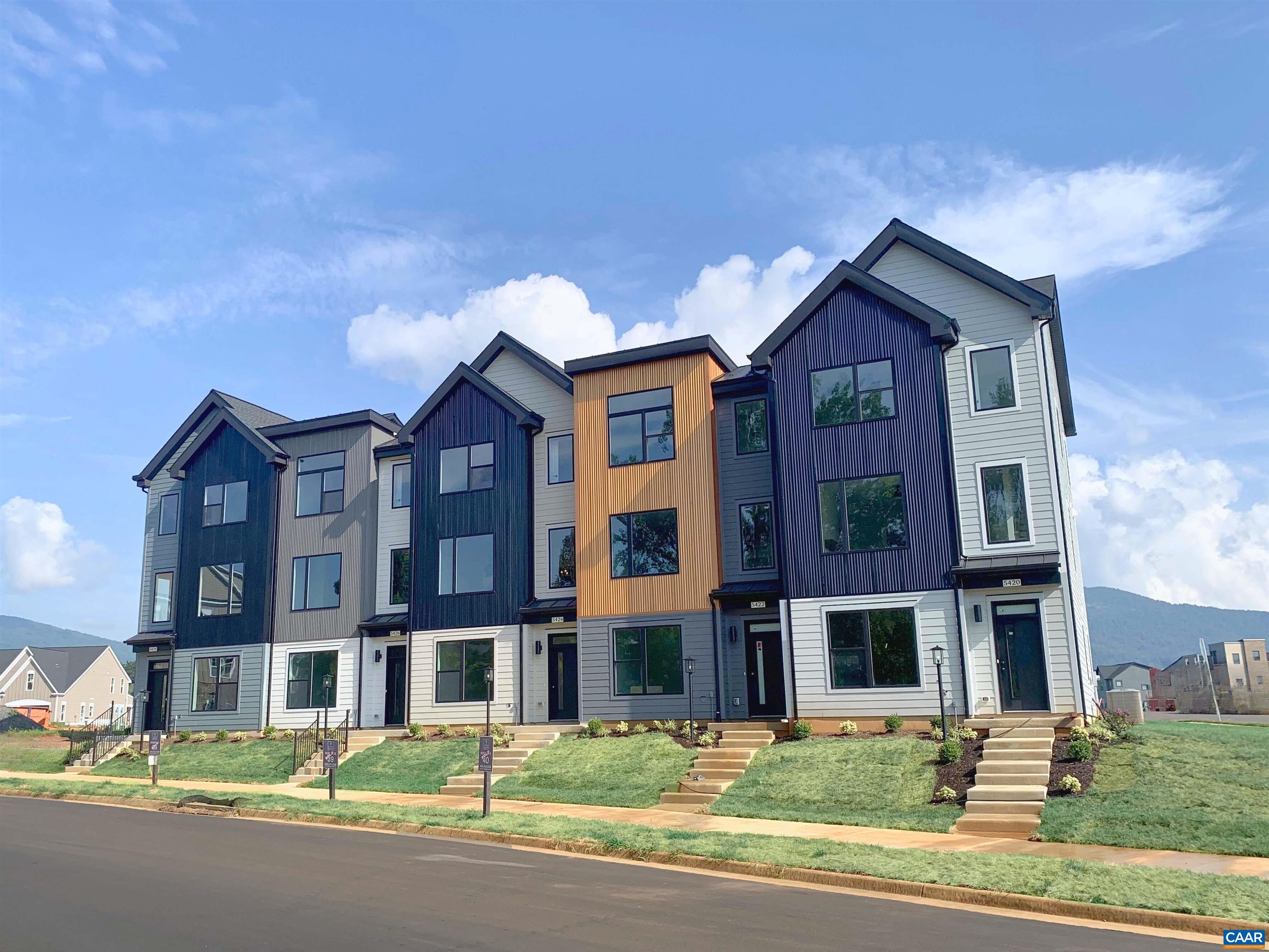 a front view of building with street