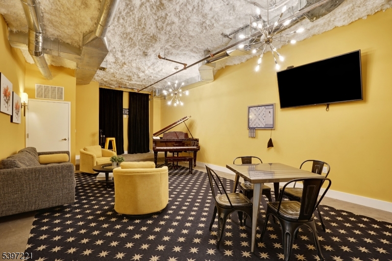 3 Ronson Road Woodbridge, NJ 08830 - Photo 12 of 17 a dining room with a table and chairs