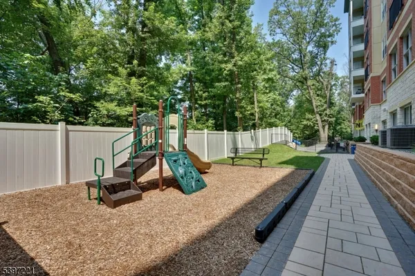 a park view with a sitting space and garden