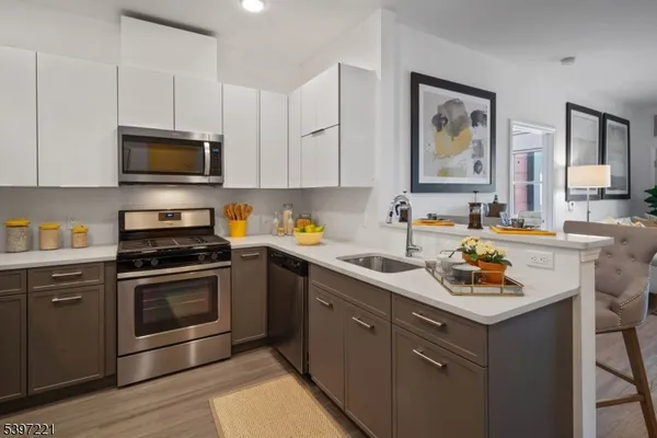 a kitchen with a stove and a sink