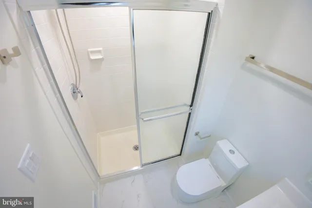 a bathroom with a sink and toilet