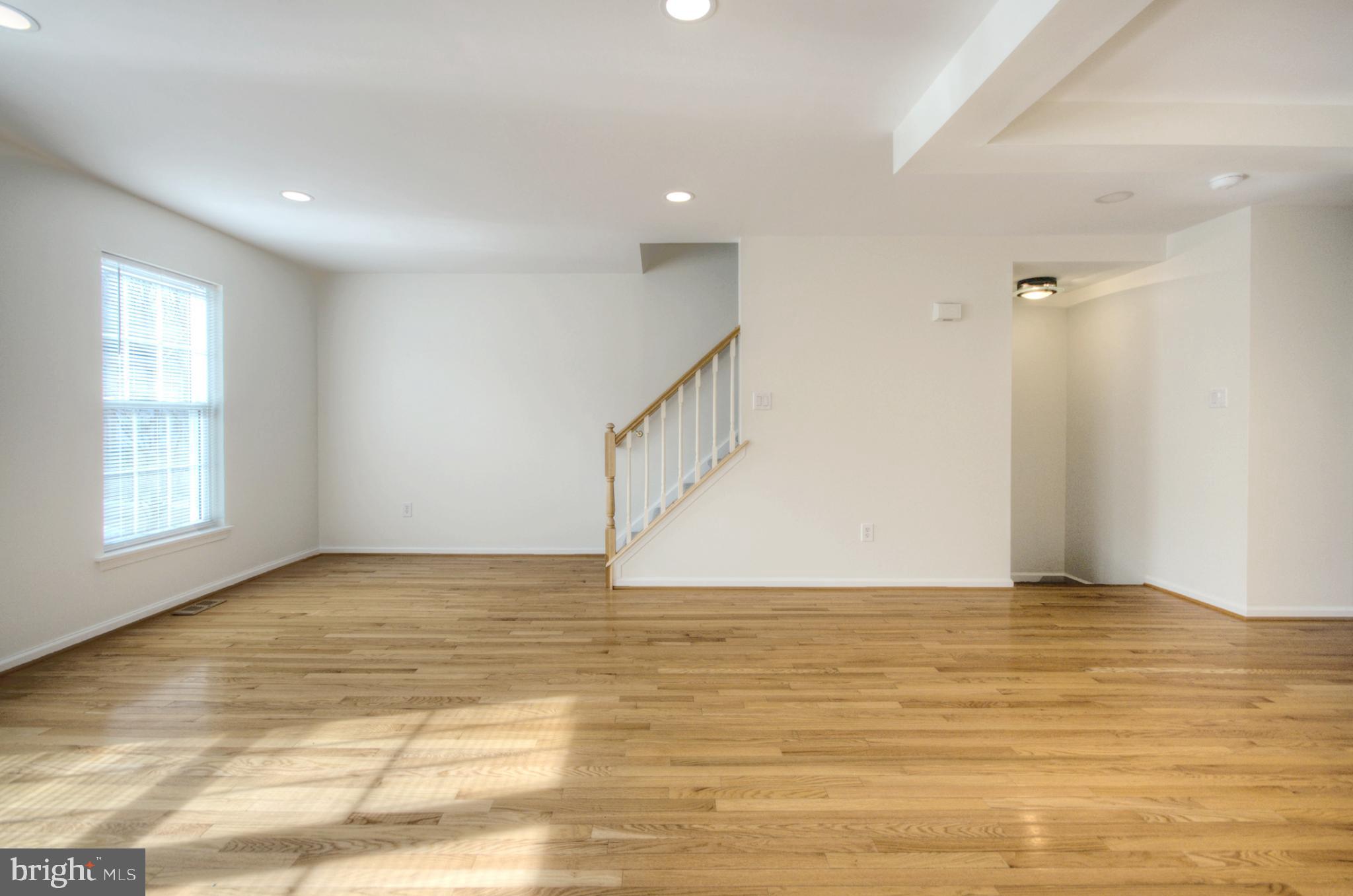 18 Alexandra Court Marlton, NJ 08053 - Photo 17 of 41 a view of an empty room with window and wooden floor