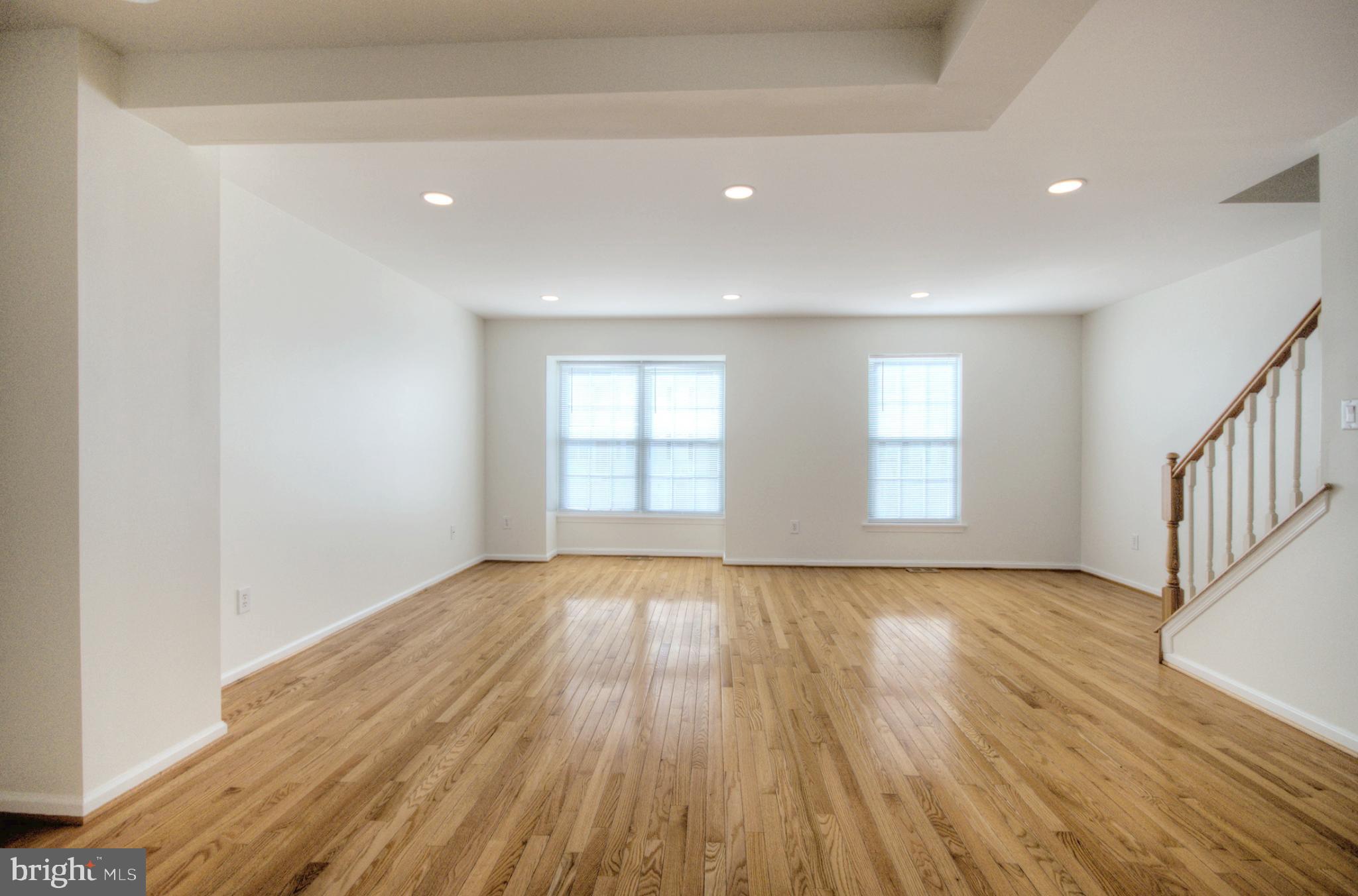 18 Alexandra Court Marlton, NJ 08053 - Photo 19 of 41 an empty room with wooden floor and windows