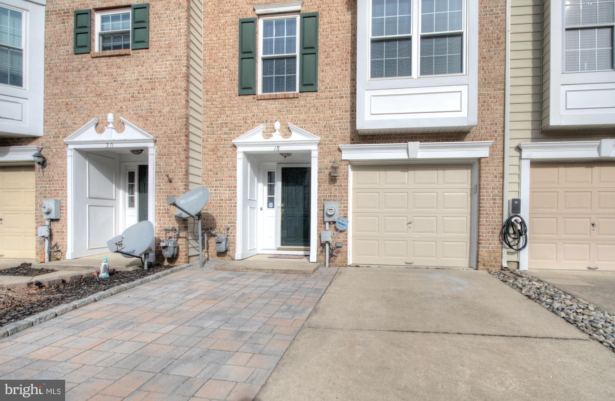 18 Alexandra Court Marlton, NJ 08053 - Photo 2 of 41 a front view of a house with a yard