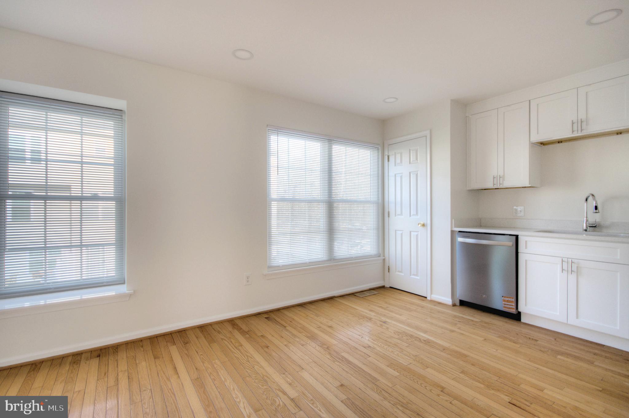 18 Alexandra Court Marlton, NJ 08053 - Photo 24 of 41 a view of a kitchen with wooden floor and a sink
