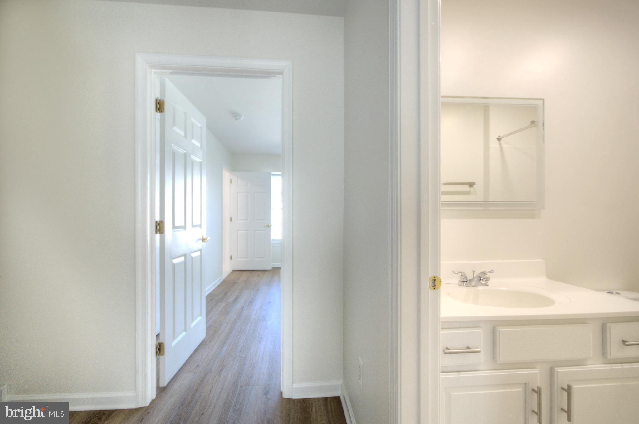 18 Alexandra Court Marlton, NJ 08053 - Photo 25 of 41 a bathroom with a sink and a mirror