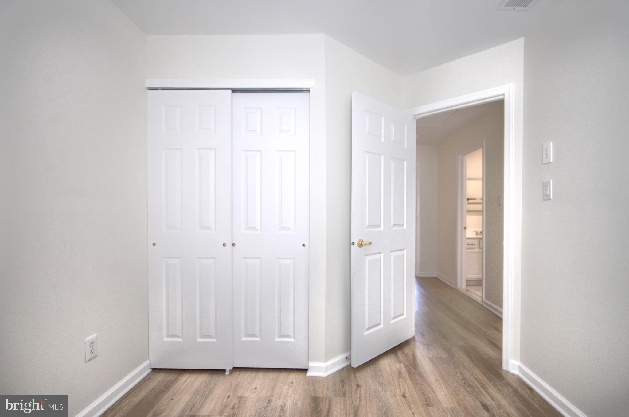 18 Alexandra Court Marlton, NJ 08053 - Photo 31 of 41 a view of a hallway with wooden floor