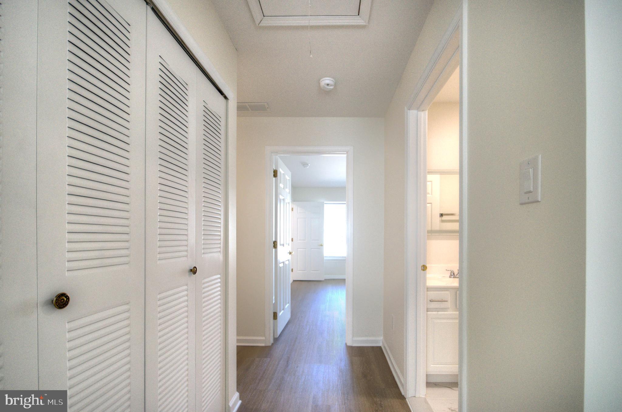 18 Alexandra Court Marlton, NJ 08053 - Photo 35 of 41 a view of a hallway with wooden floor