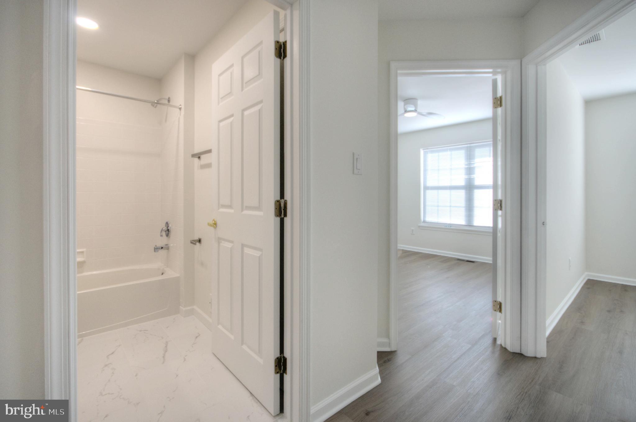 18 Alexandra Court Marlton, NJ 08053 - Photo 36 of 41 a bathroom with a bathtub and shower