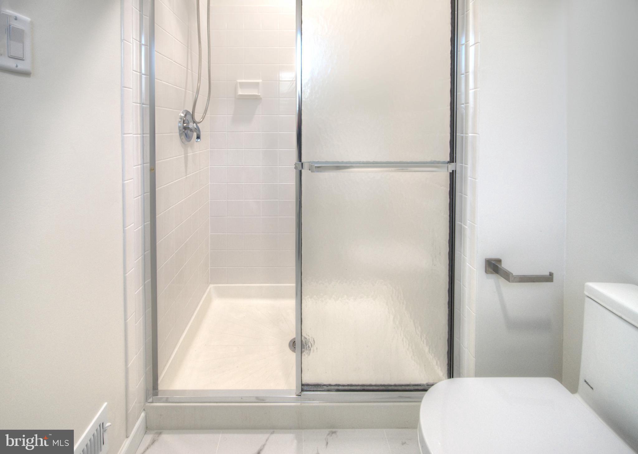 18 Alexandra Court Marlton, NJ 08053 - Photo 41 of 41 a bathroom with a toilet and a shower