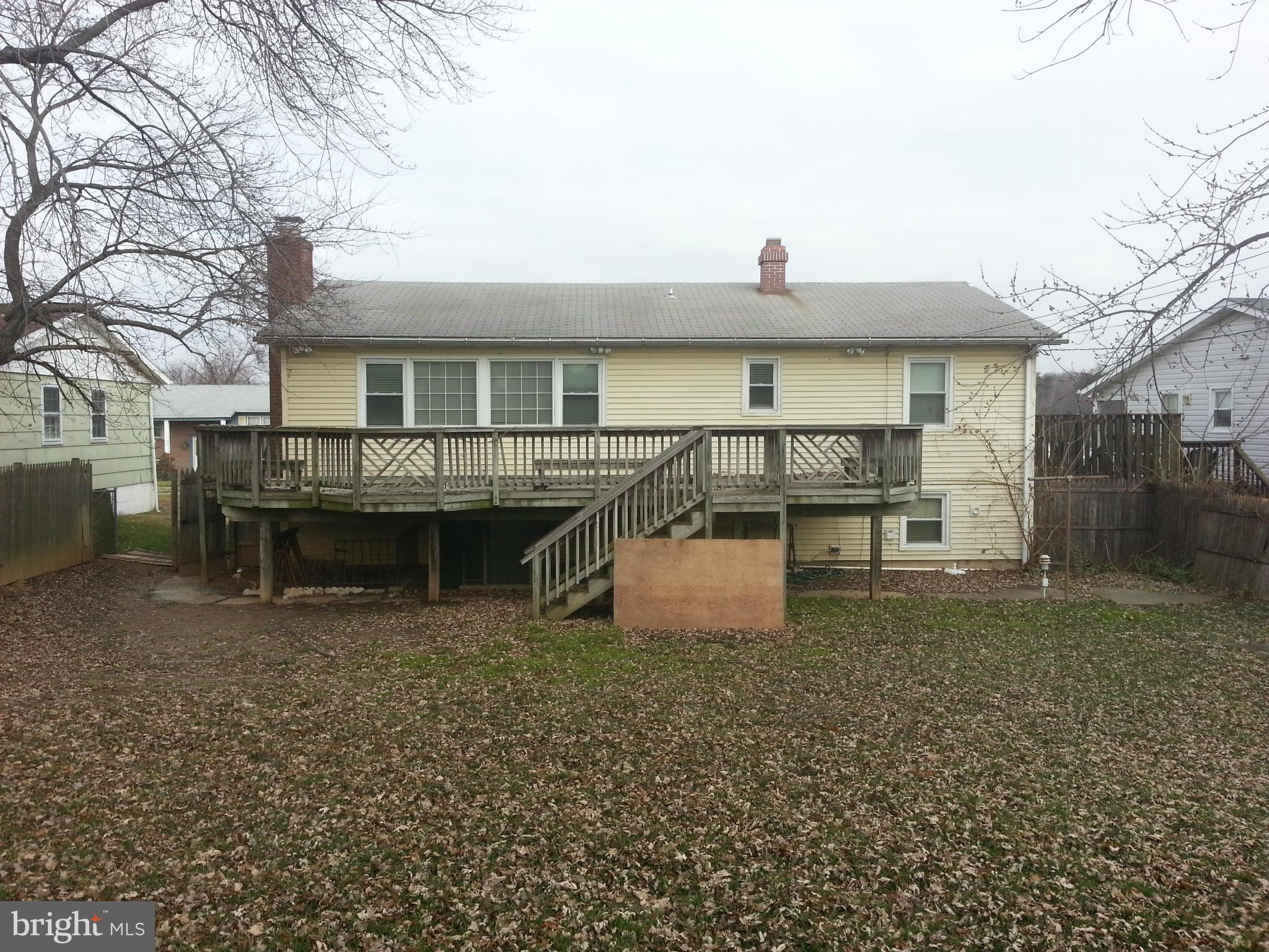 6707 Fordcrest Road Baltimore, MD 21237 - Photo 2 of 21 a front view of a house with a yard