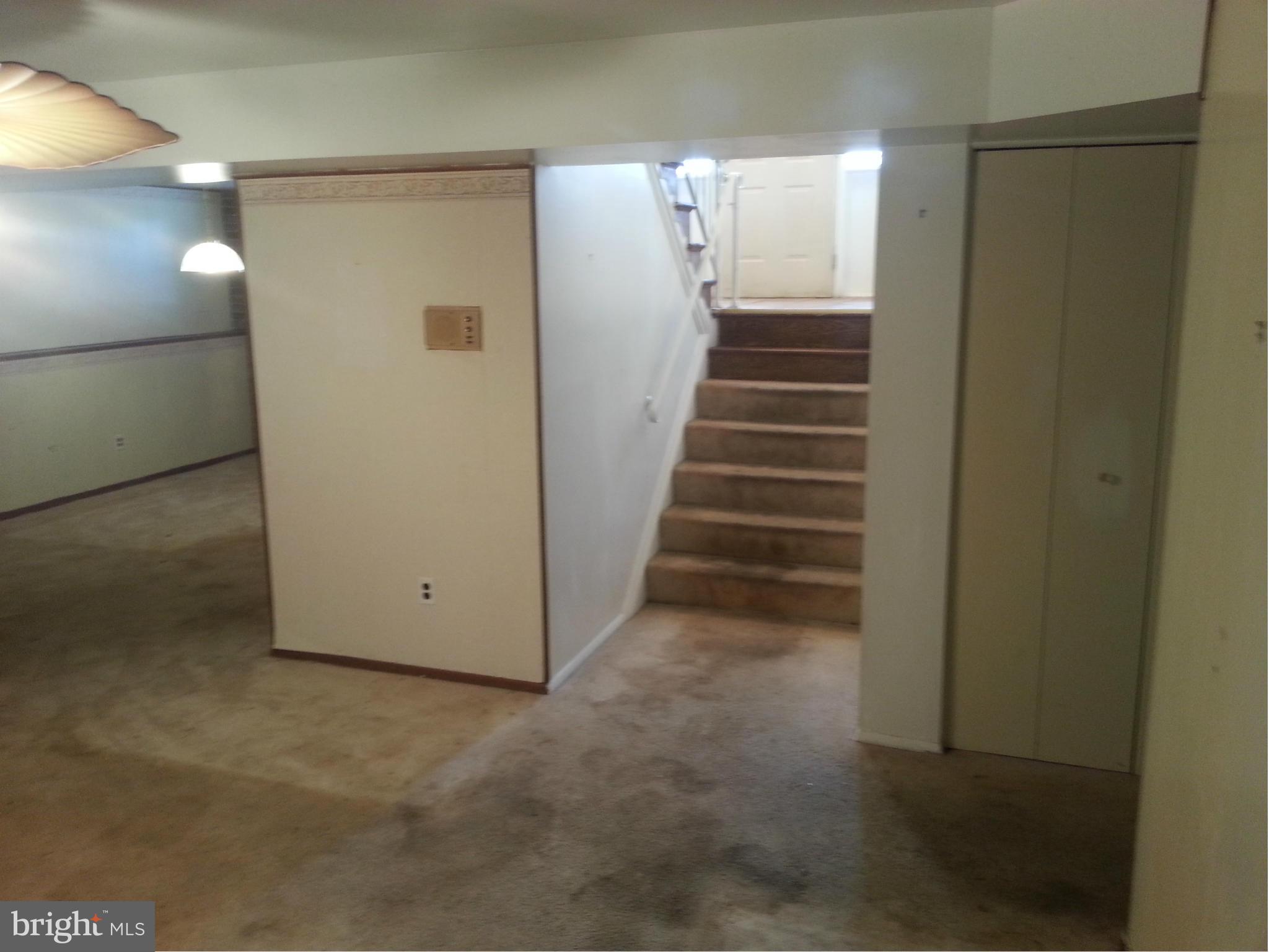 6707 Fordcrest Road Baltimore, MD 21237 - Photo 12 of 21 a view of a hallway with entryway and stairs