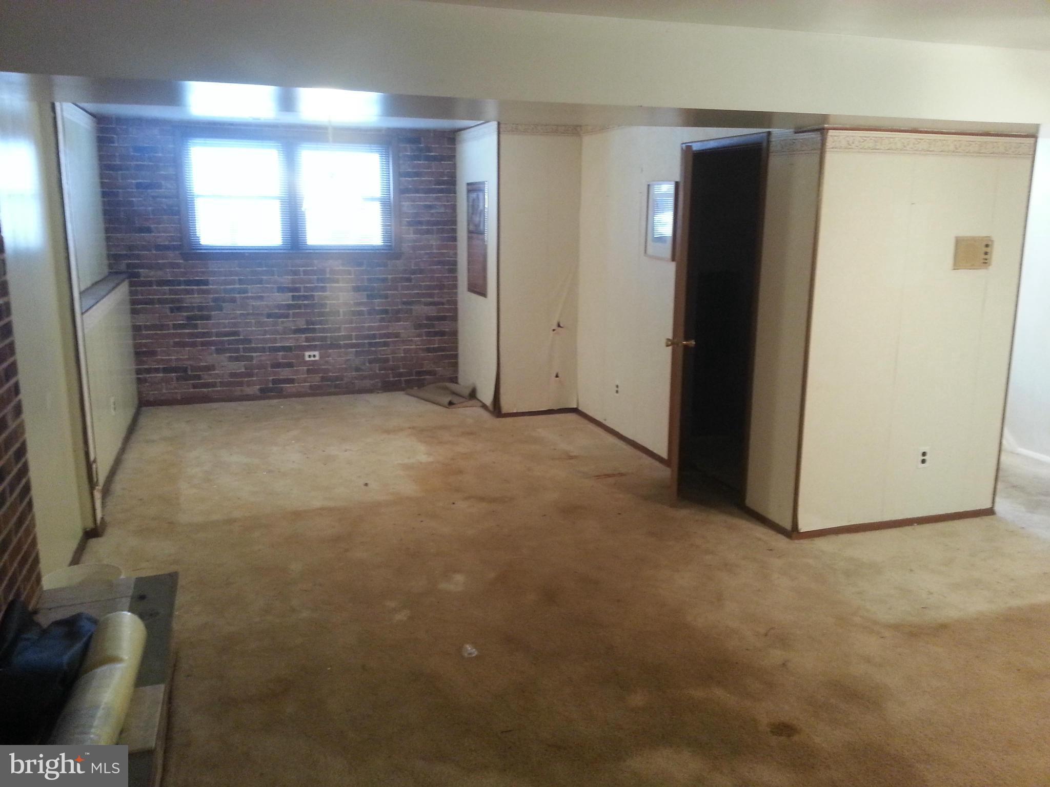 6707 Fordcrest Road Baltimore, MD 21237 - Photo 17 of 21 a view of an empty room and window