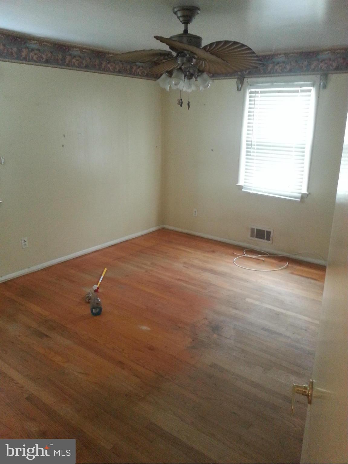 6707 Fordcrest Road Baltimore, MD 21237 - Photo 21 of 21 an empty room with a window