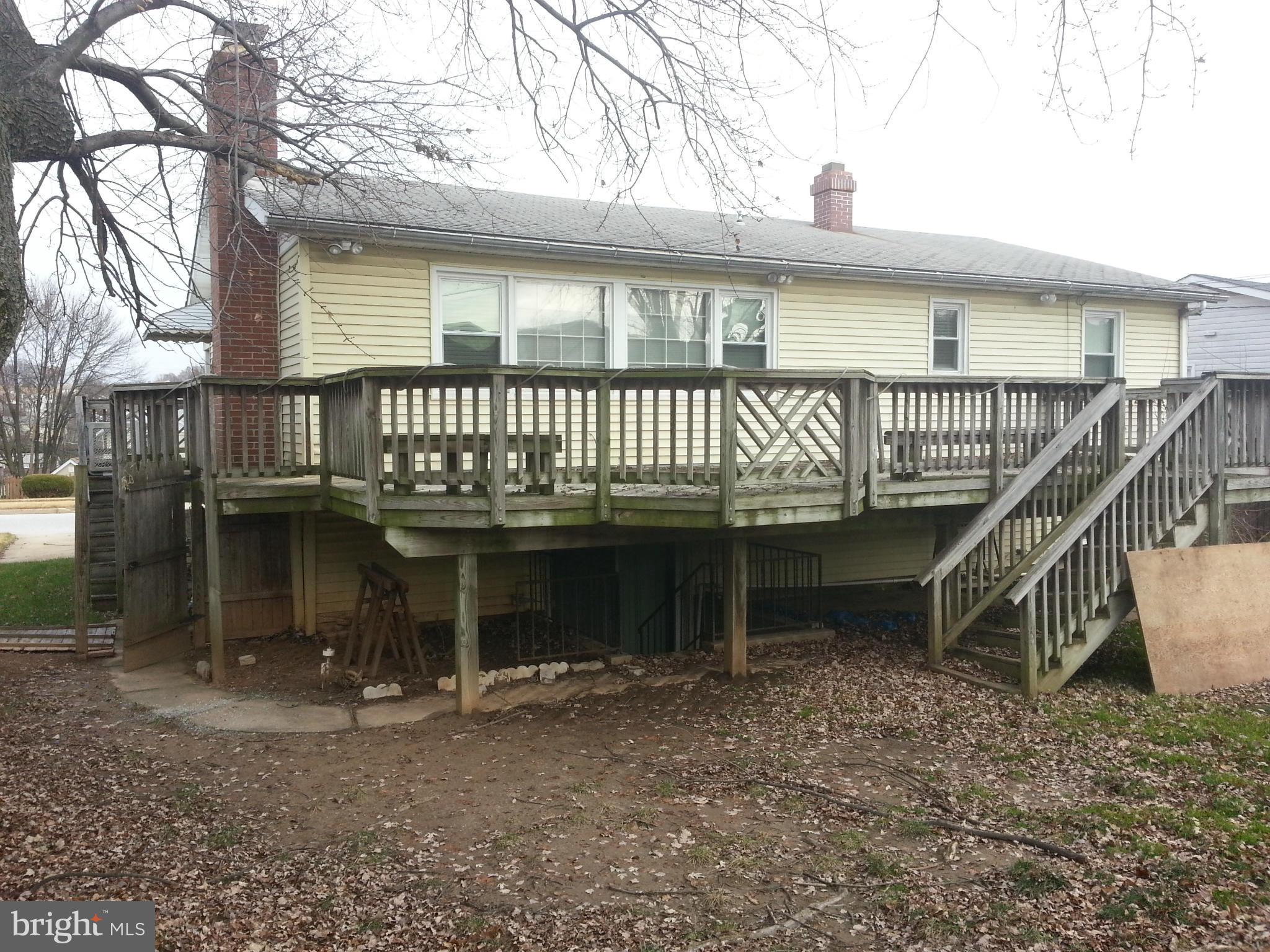 6707 Fordcrest Road Baltimore, MD 21237 - Photo 4 of 21 a front view of a house with a yard
