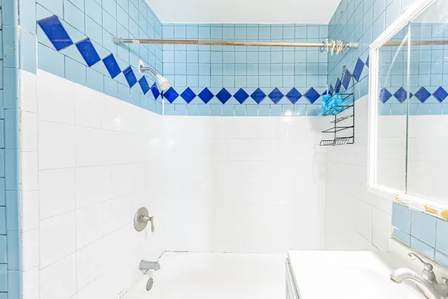 a view of a house with a street