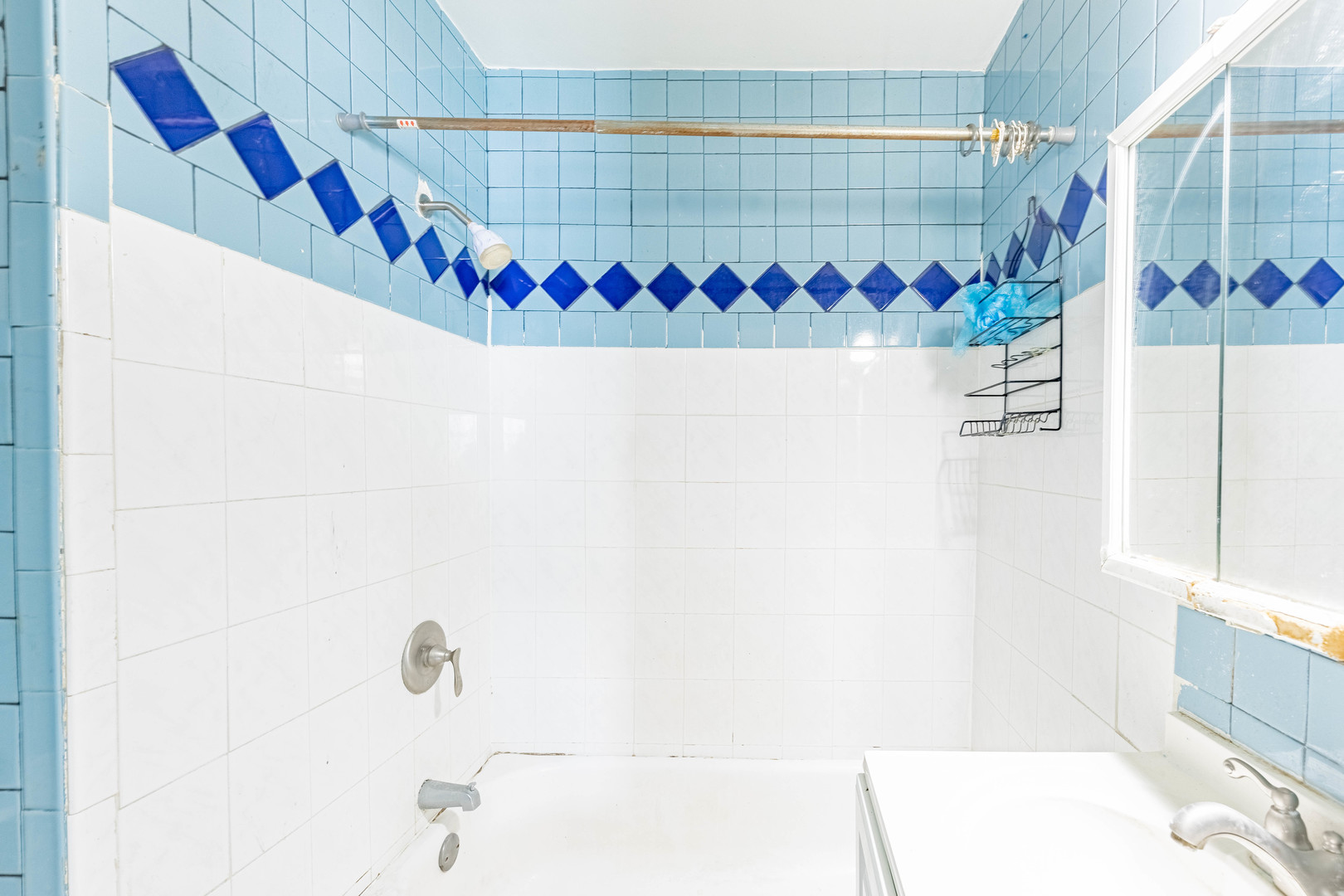 3022 South Homan Avenue Chicago, IL 60623 - Photo 25 of 29 a bathroom with a shower and a sink