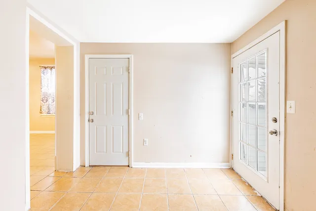 a view of a house with a street