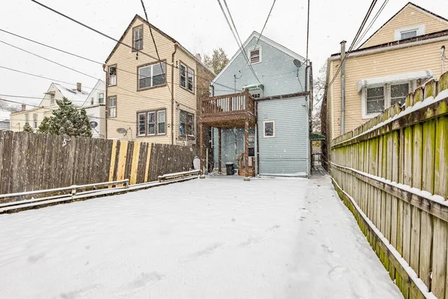 a view of a house with a street