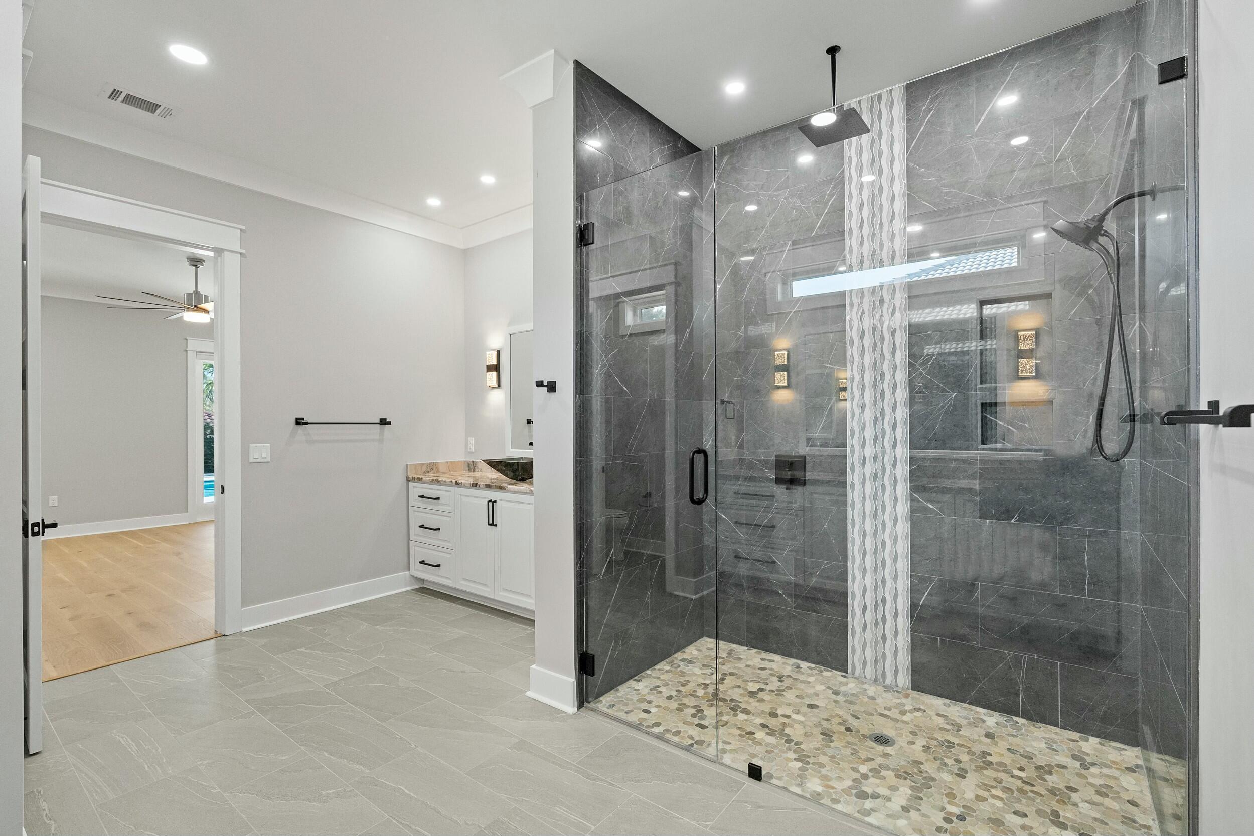 198 Emerald Ridge Santa Rosa Beach, FL 32459 - Photo 30 of 66 a bathroom with a bathtub shower sink and toilet