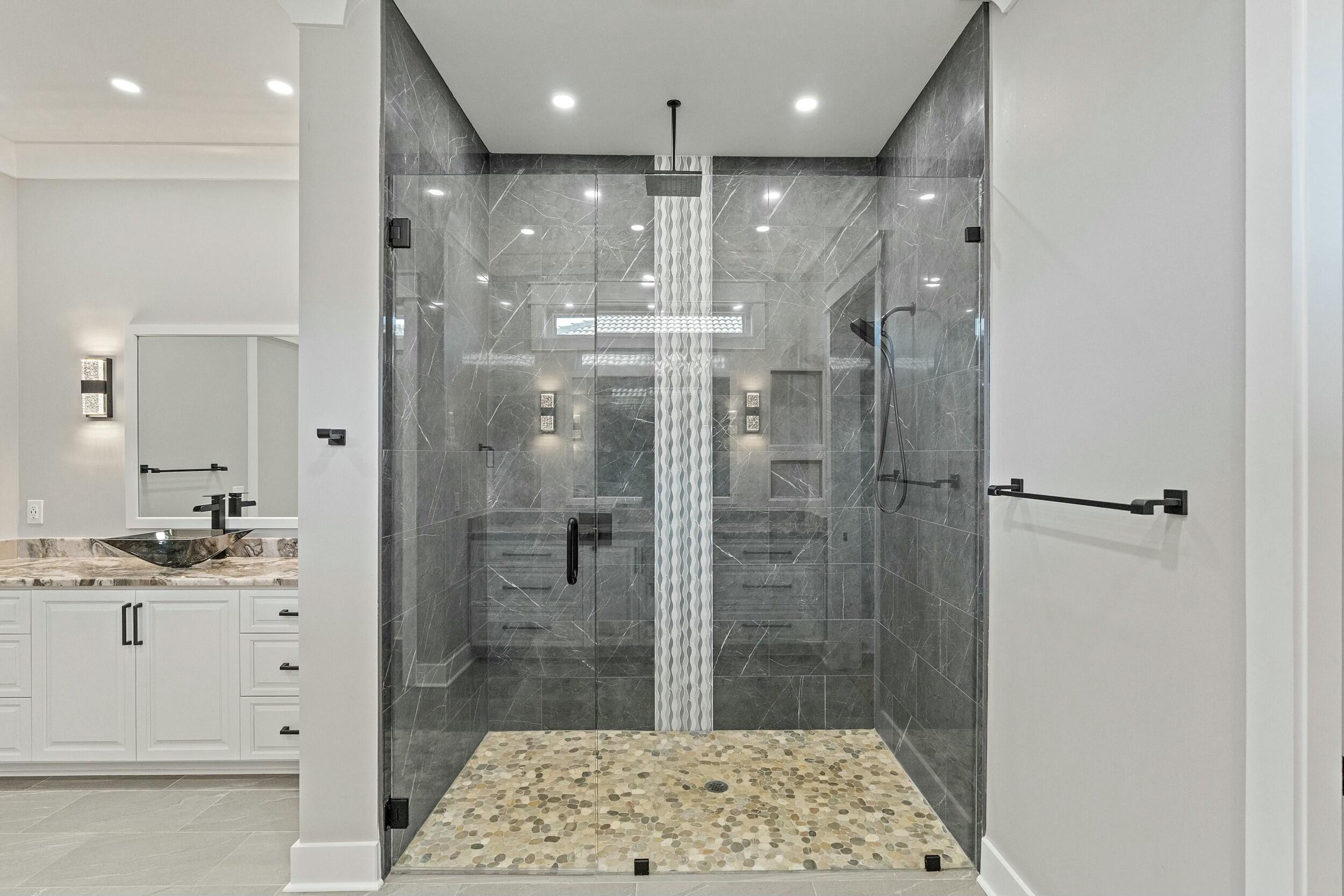 198 Emerald Ridge Santa Rosa Beach, FL 32459 - Photo 31 of 66 a bathroom with a shower and a sink