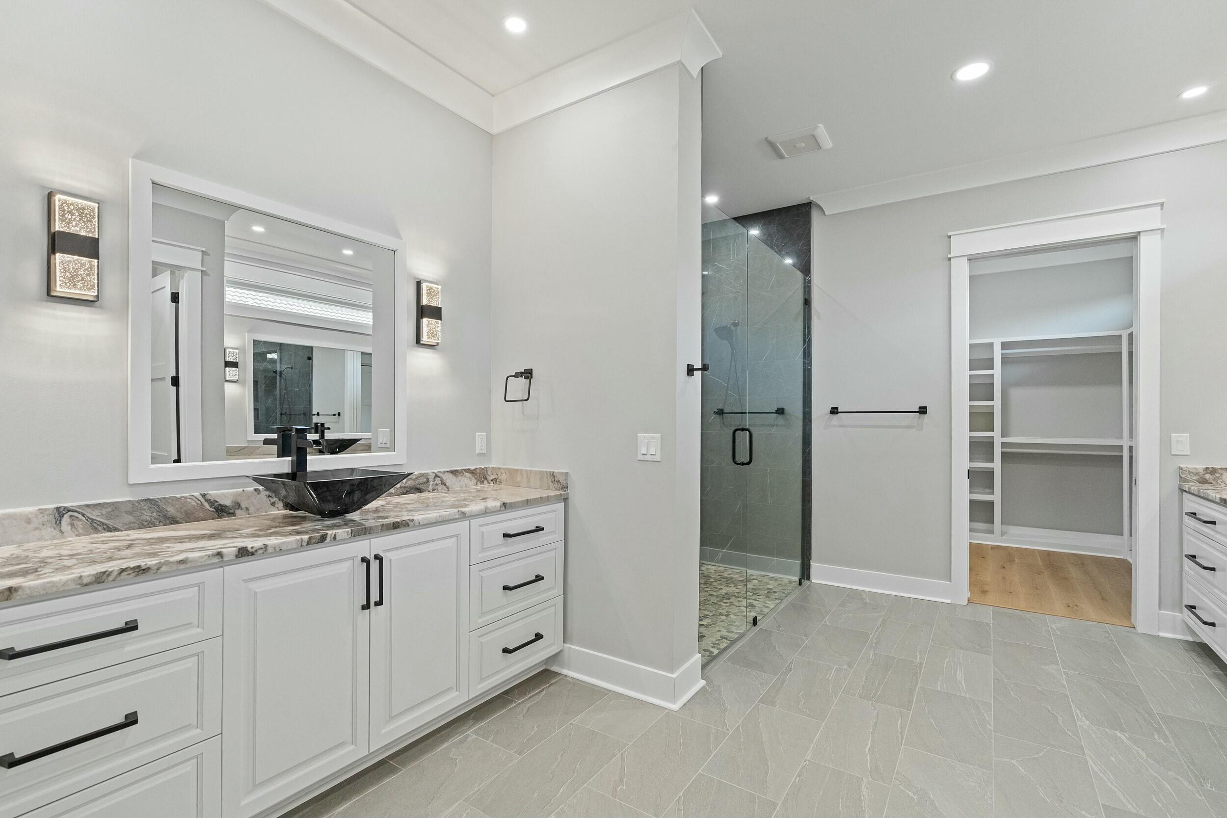 198 Emerald Ridge Santa Rosa Beach, FL 32459 - Photo 32 of 66 a bathroom with a granite countertop sink mirror and