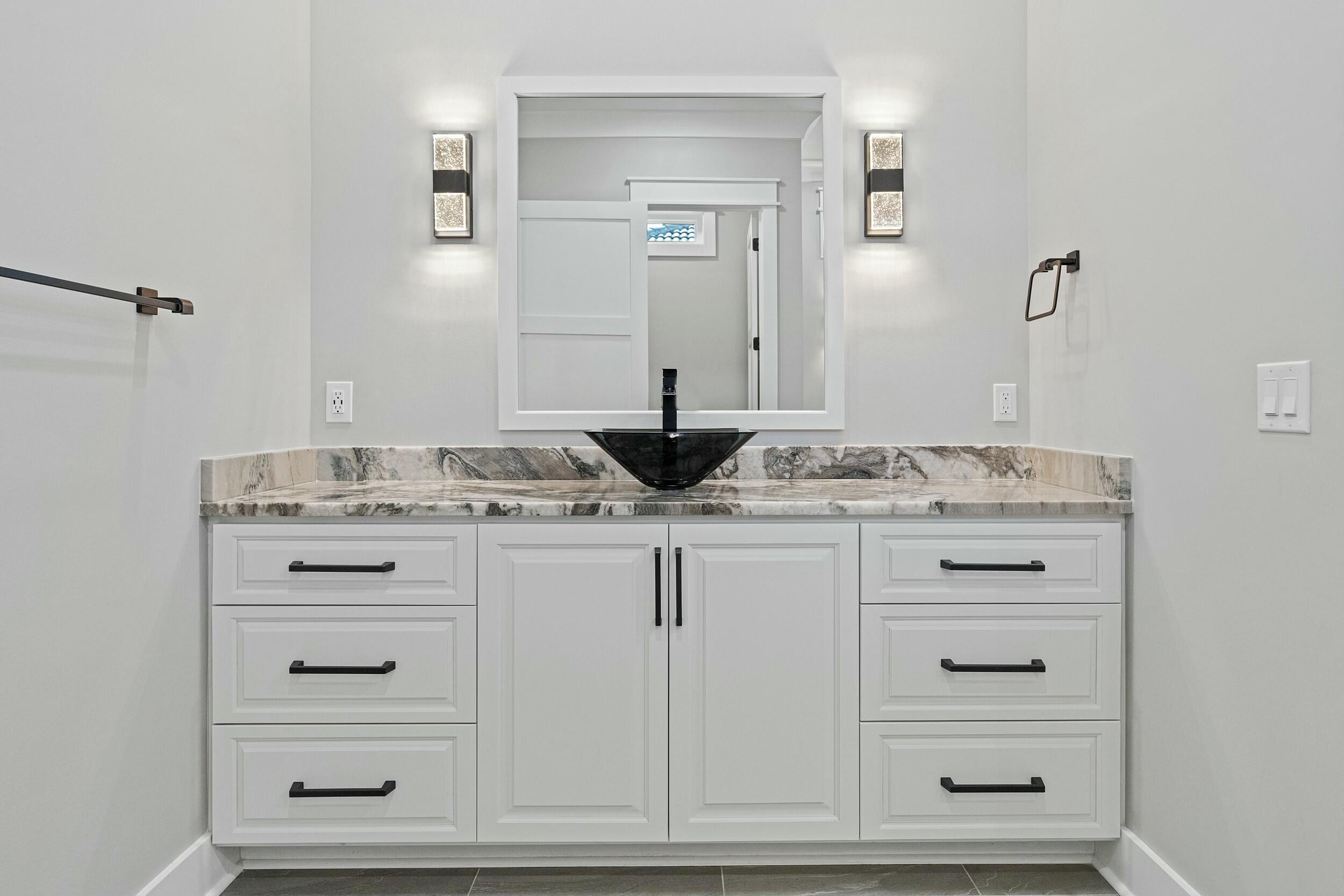 198 Emerald Ridge Santa Rosa Beach, FL 32459 - Photo 35 of 66 a bathroom with a granite countertop sink and vanity