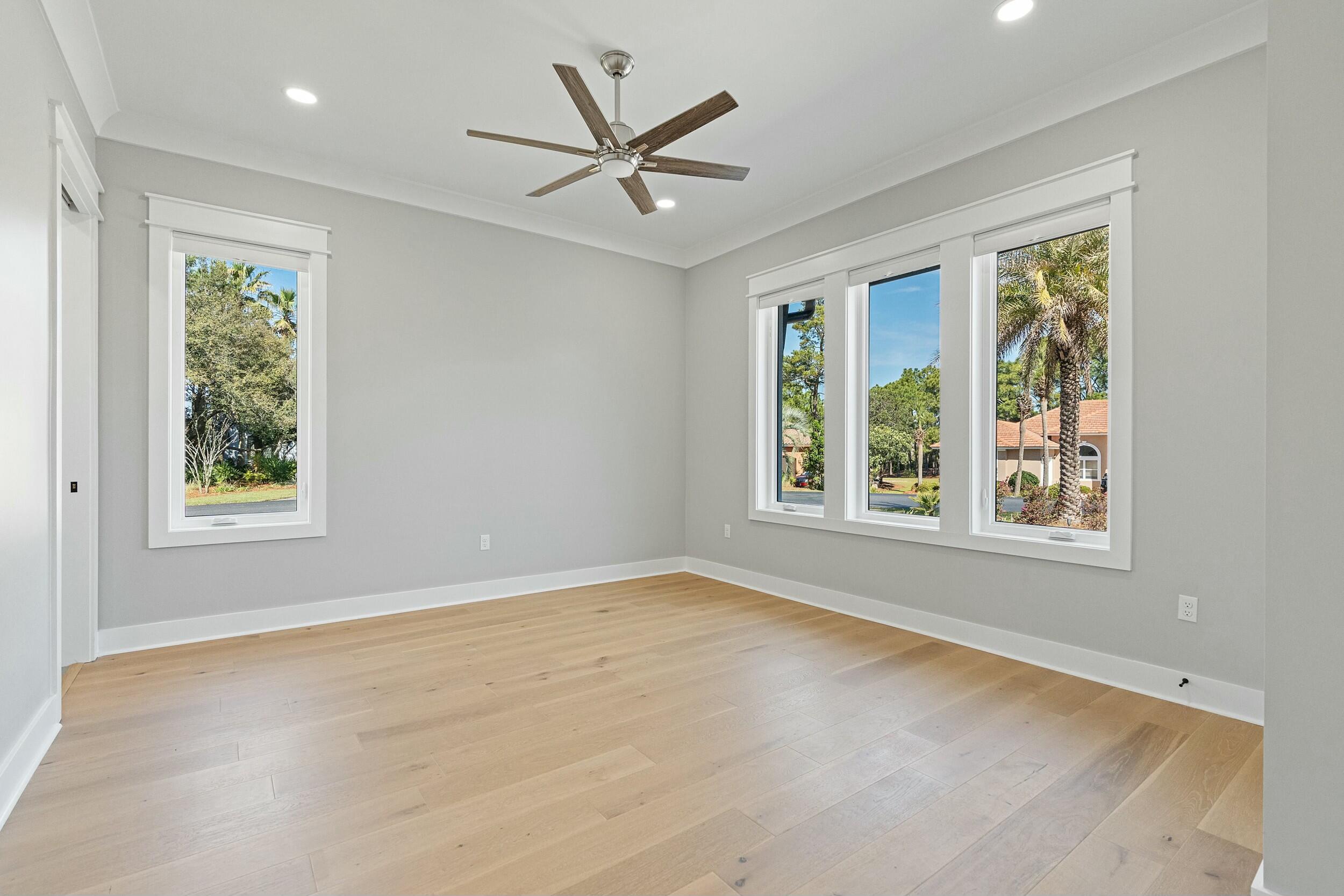 198 Emerald Ridge Santa Rosa Beach, FL 32459 - Photo 36 of 66 a view of a livingroom with a ceiling fan and window