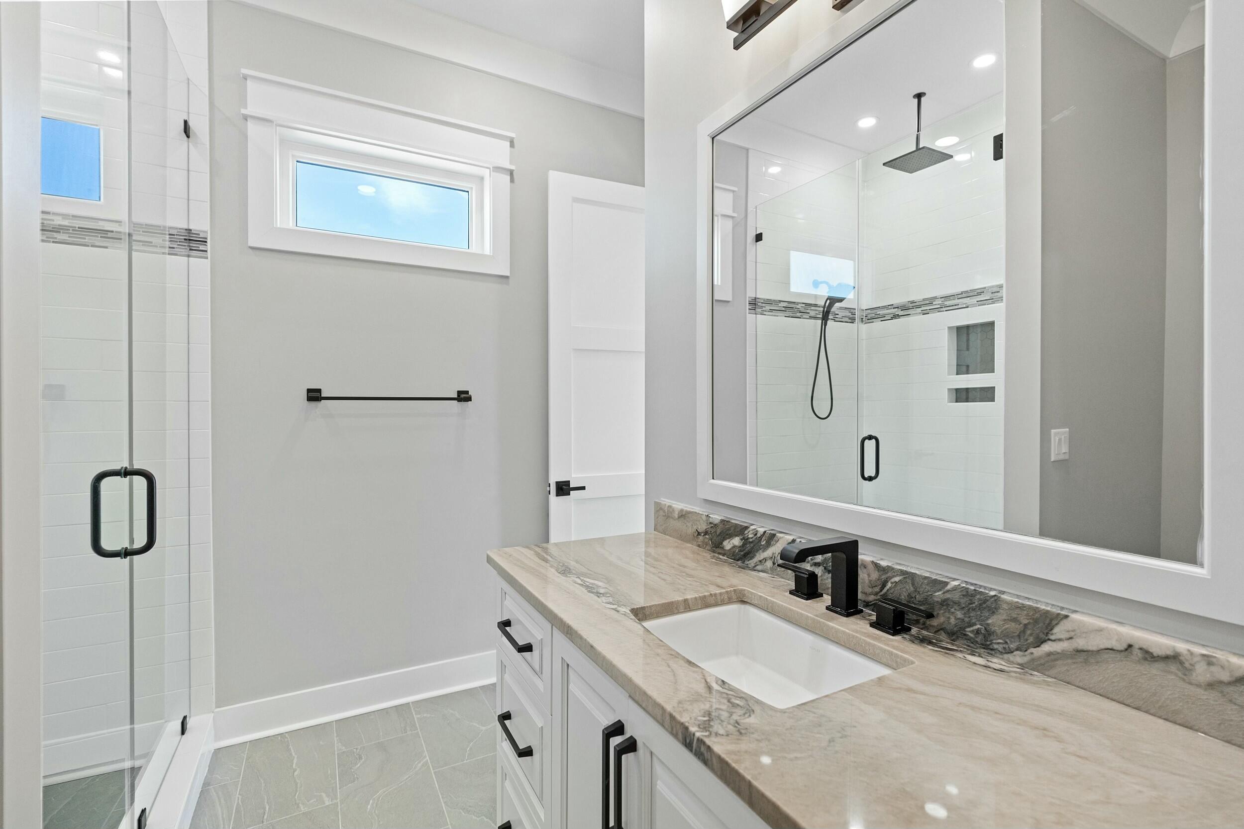 198 Emerald Ridge Santa Rosa Beach, FL 32459 - Photo 44 of 66 a bathroom with a granite countertop sink mirror and double