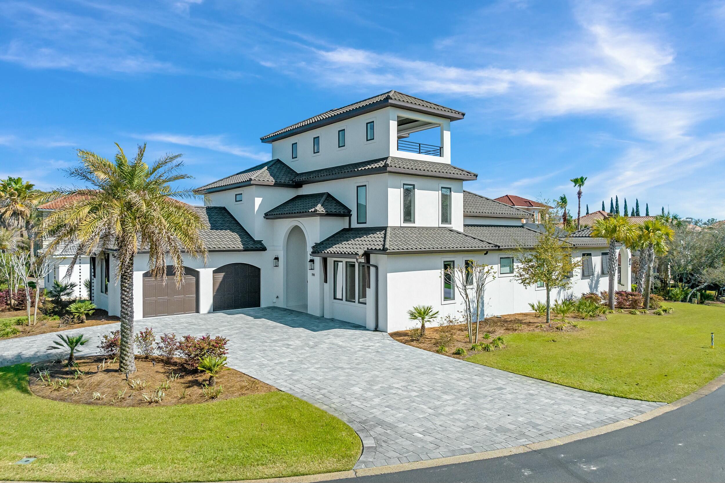 198 Emerald Ridge Santa Rosa Beach, FL 32459 - Photo 5 of 66 a front view of a house with a yard