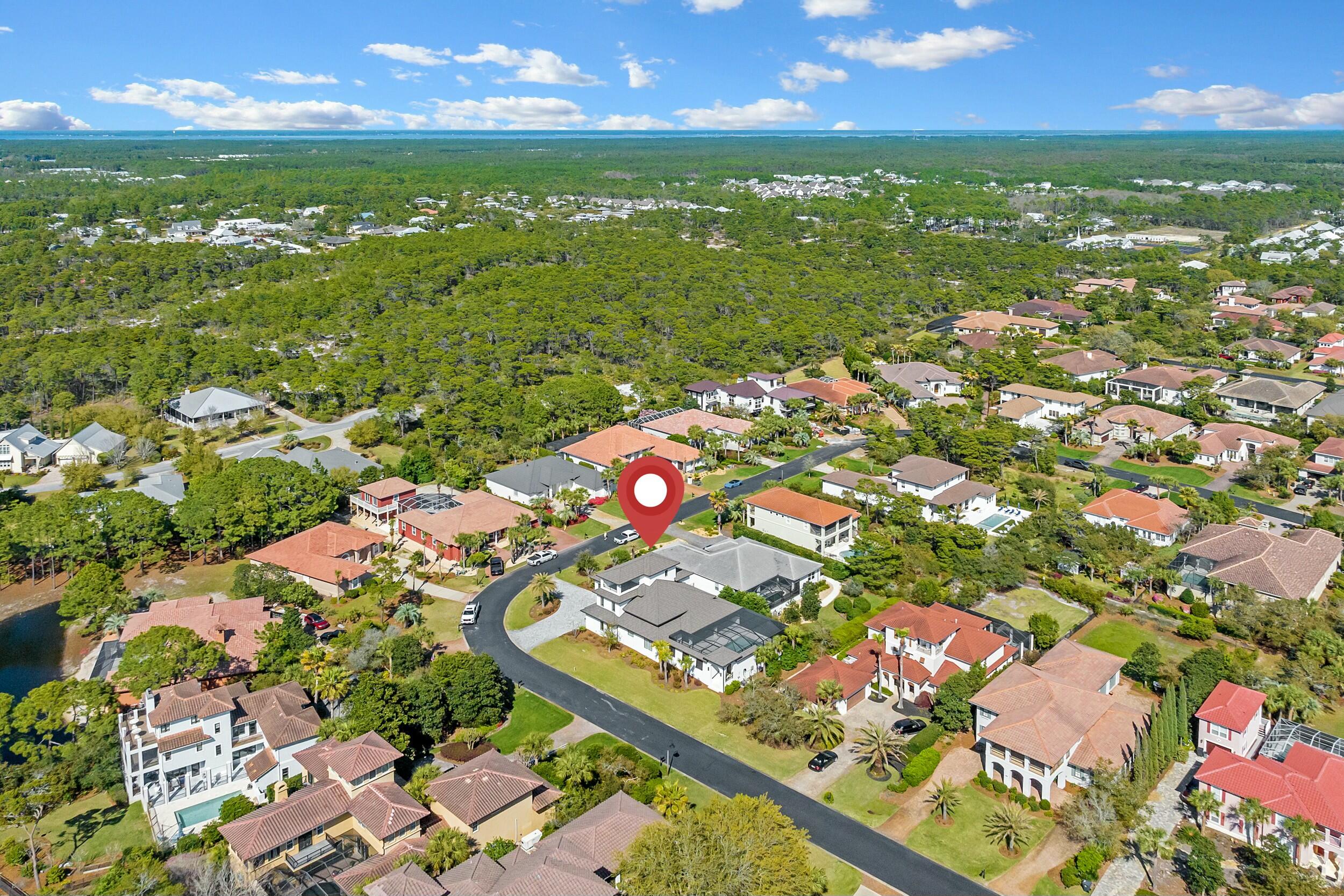 198 Emerald Ridge Santa Rosa Beach, FL 32459 - Photo 64 of 66 an aerial view of residential houses with outdoor space and swimming pool