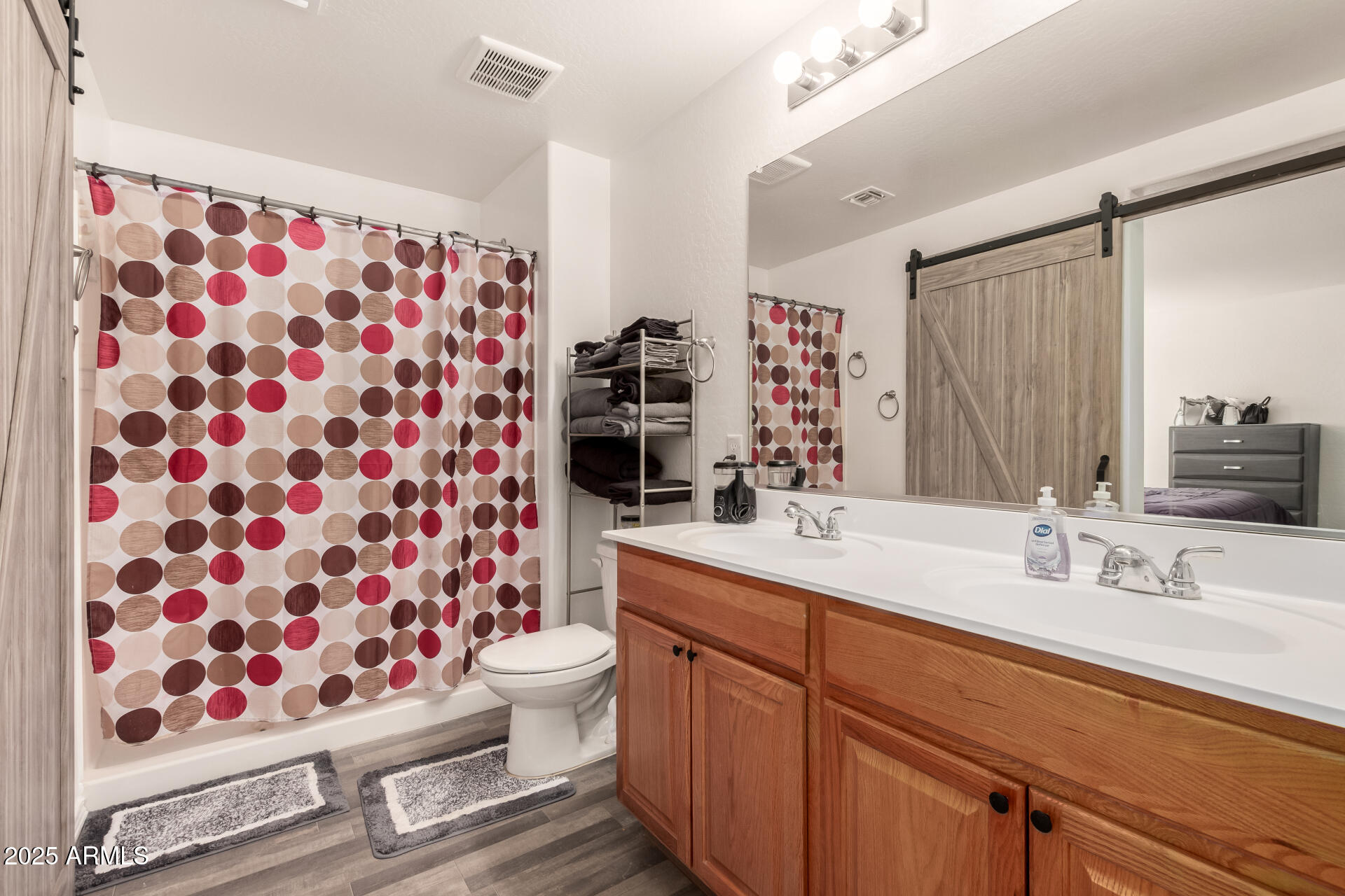 910 Prior Avenue Coolidge, AZ 85128 - Photo 11 of 22 a bathroom with a sink toilet and shower