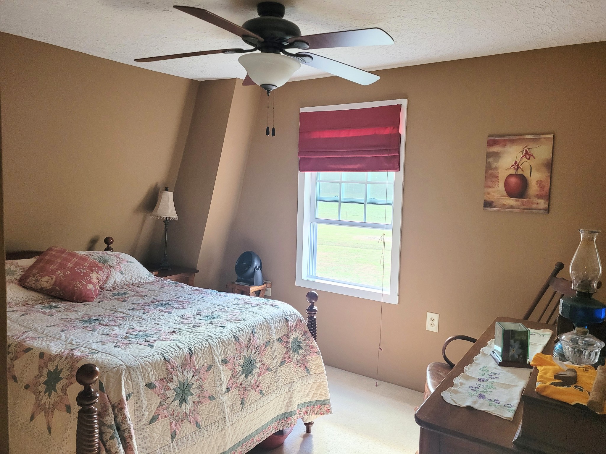 196 Nate Floyd Road Manchester, TN 37355 - Photo 20 of 36 a bedroom with a bed and a window