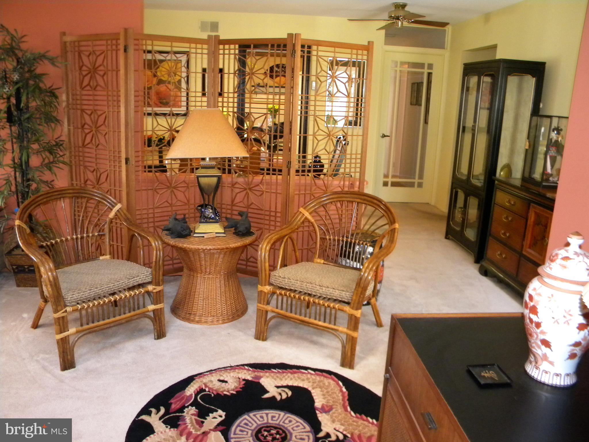 22 Dunstable Road Southampton, NJ 08088 - Photo 5 of 34 a dining room with furniture and a floor to ceiling window