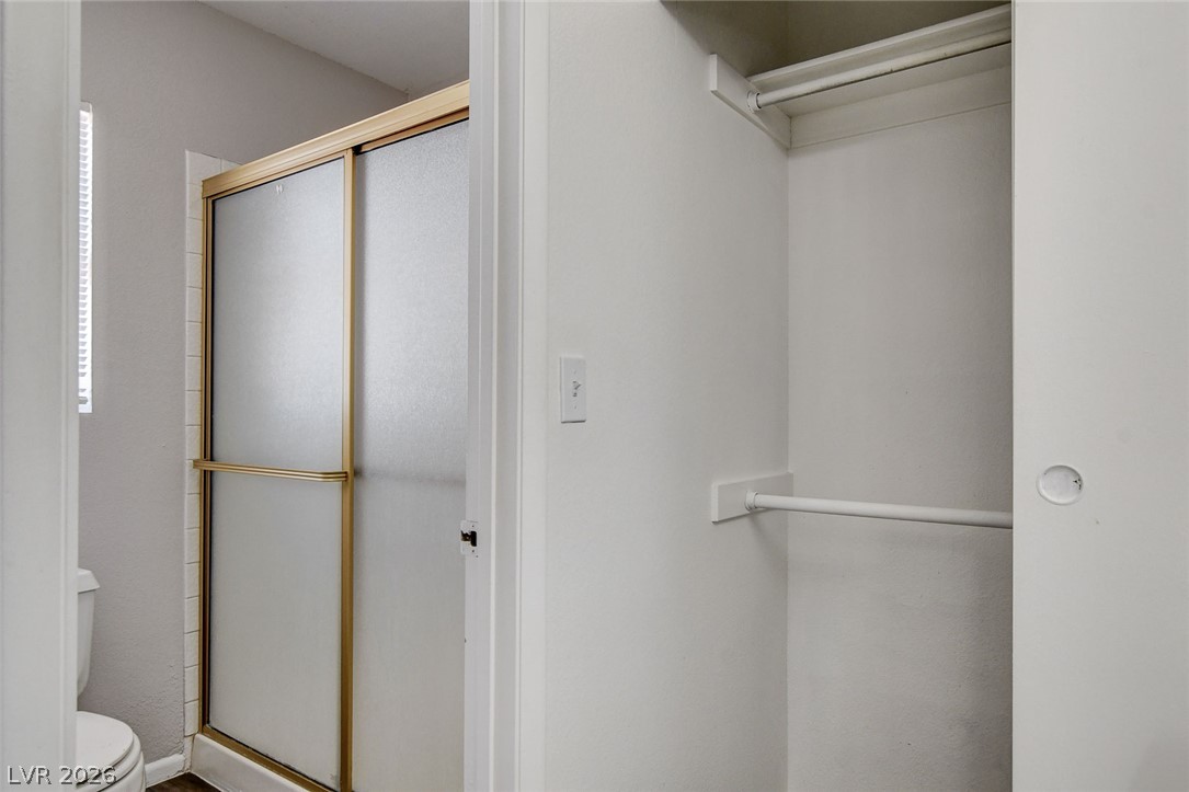 6209 Warm River Road Las Vegas, NV 89108 - Photo 30 of 39 Functional layout combining a shower enclosure and a convenient closet space for practical living.