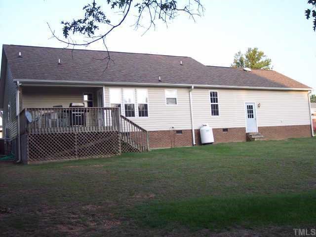 875 Bill Avery Road Coats, NC 27521 - Photo 7 of 8 a front view of a house with garden