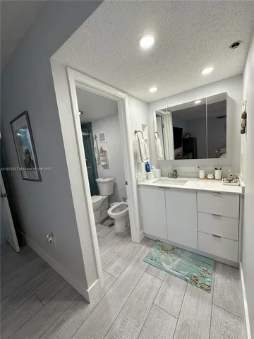 a view of a buildings with a street