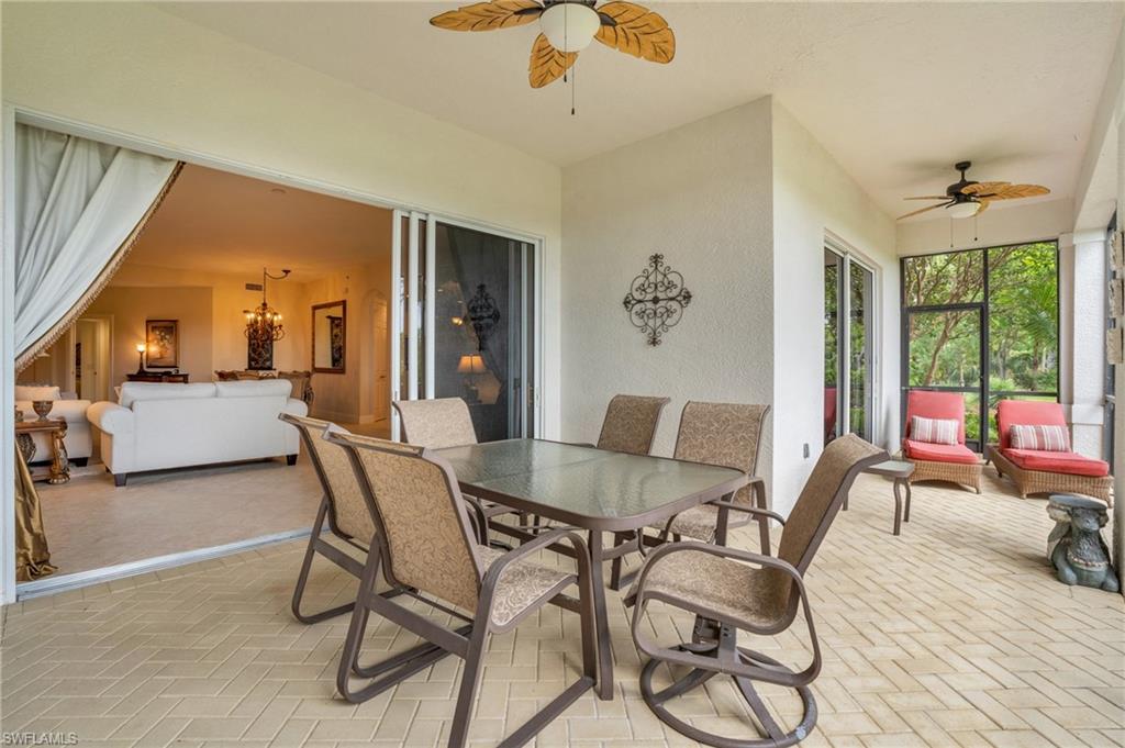9006 Cascada Way, Unit 101 Naples, FL 34114 - Photo 2 of 25 a view of a livingroom and dining room