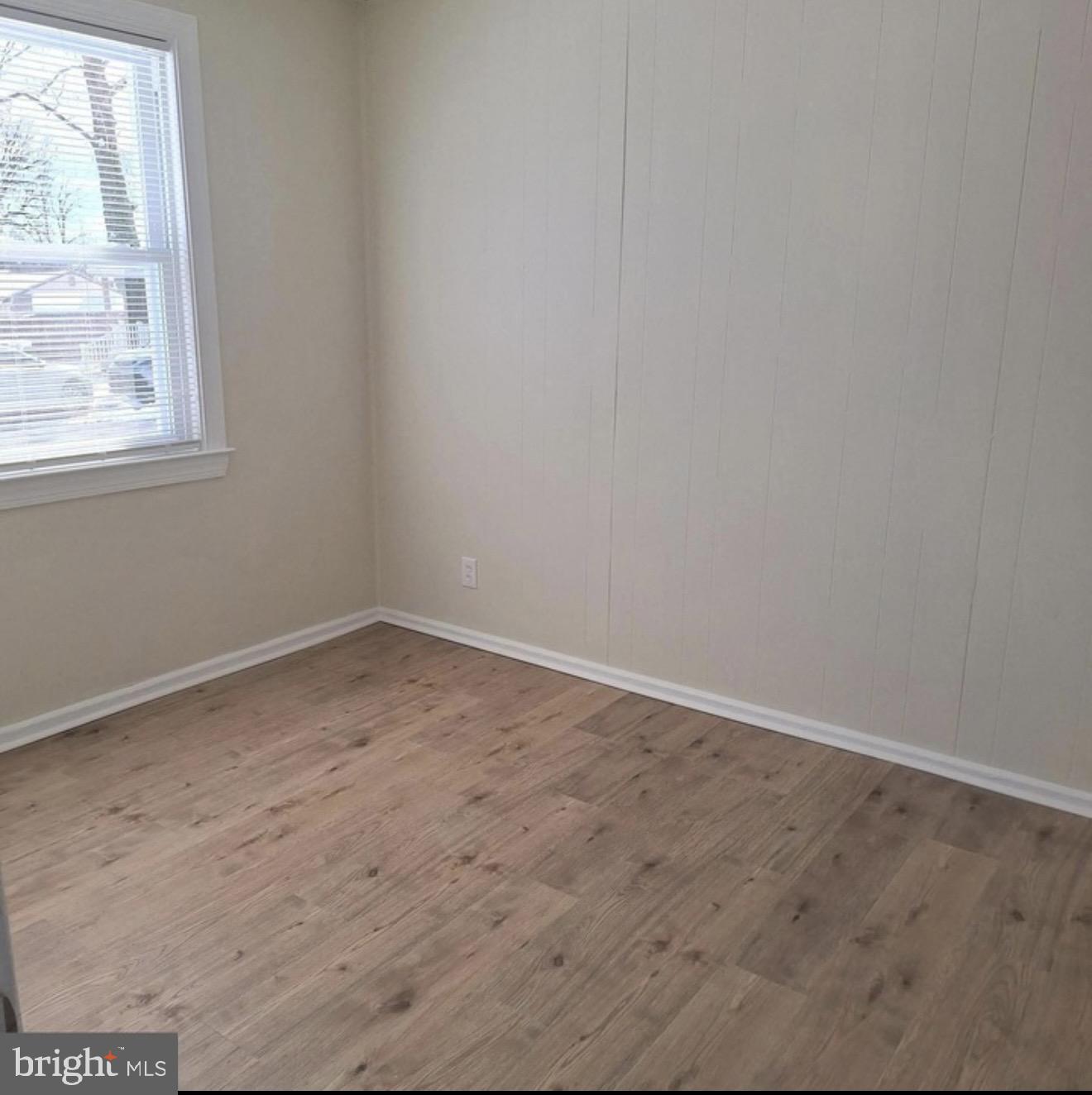 403 Trenton Court Wallingford, PA 19086 - Photo 8 of 11 an empty room with a window