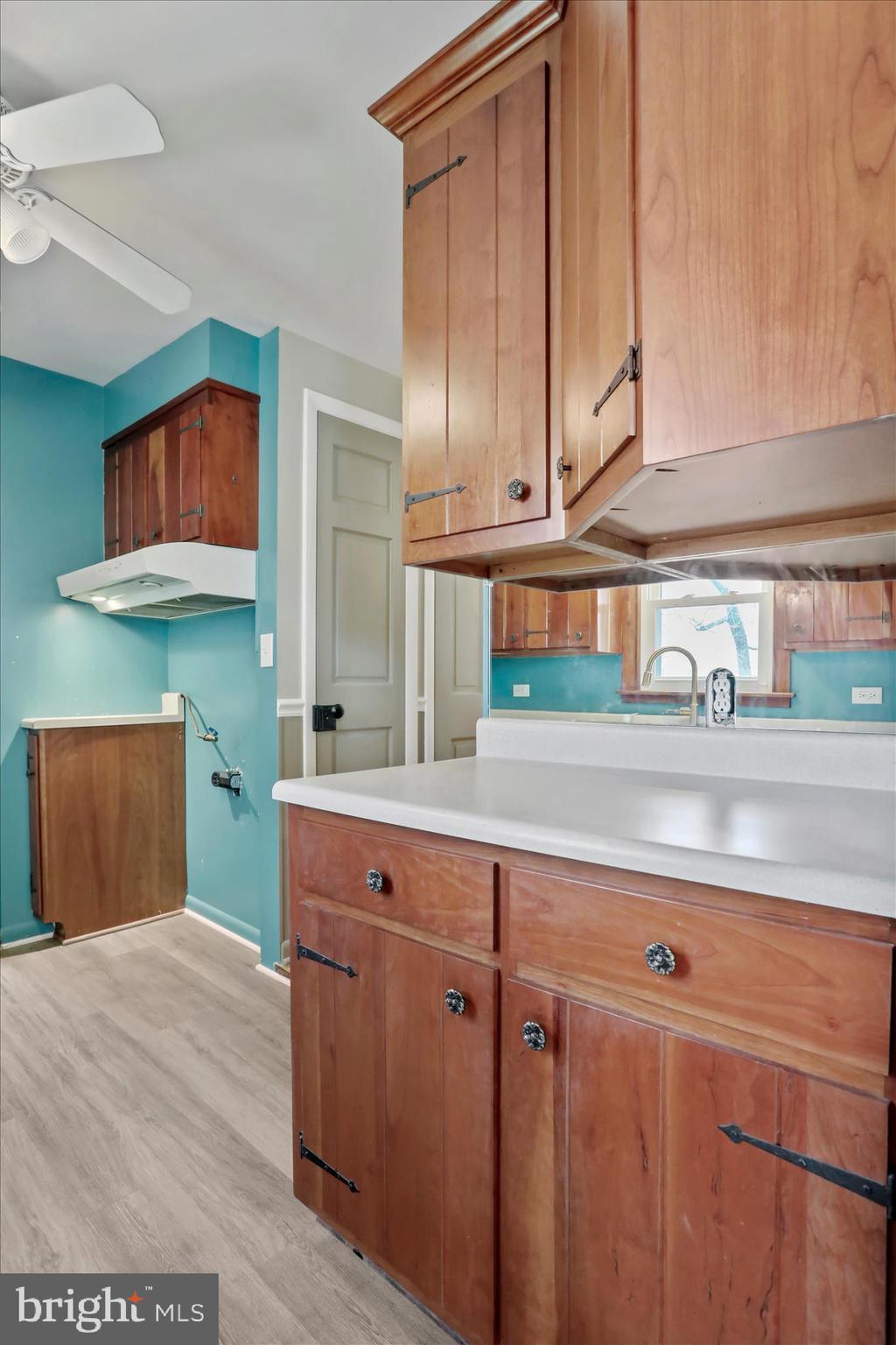 21938 Durberry Road Smithsburg, MD 21783 - Photo 18 of 55 a kitchen with cabinets and window