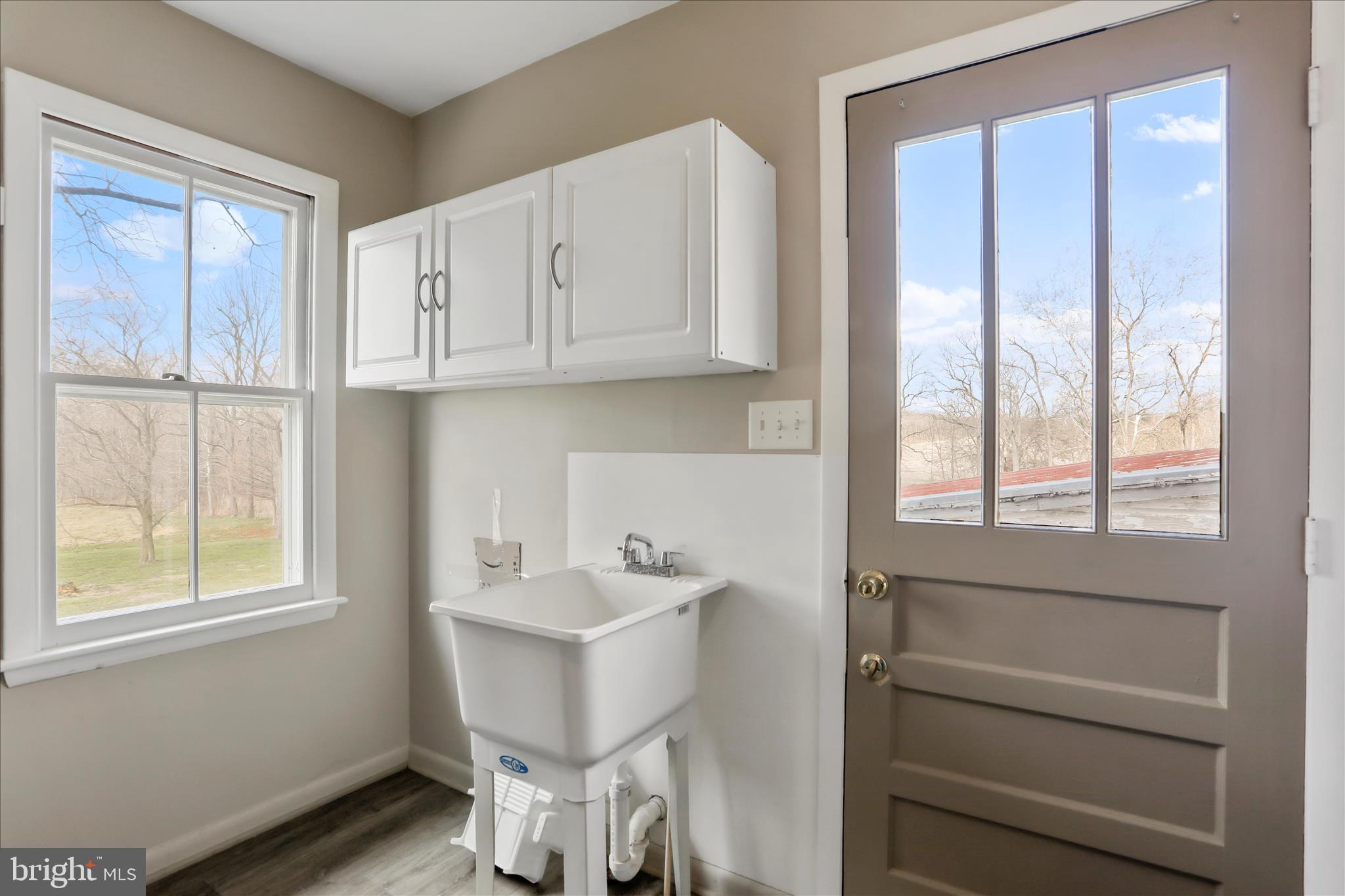 21938 Durberry Road Smithsburg, MD 21783 - Photo 20 of 55 a bathroom with a sink and a window