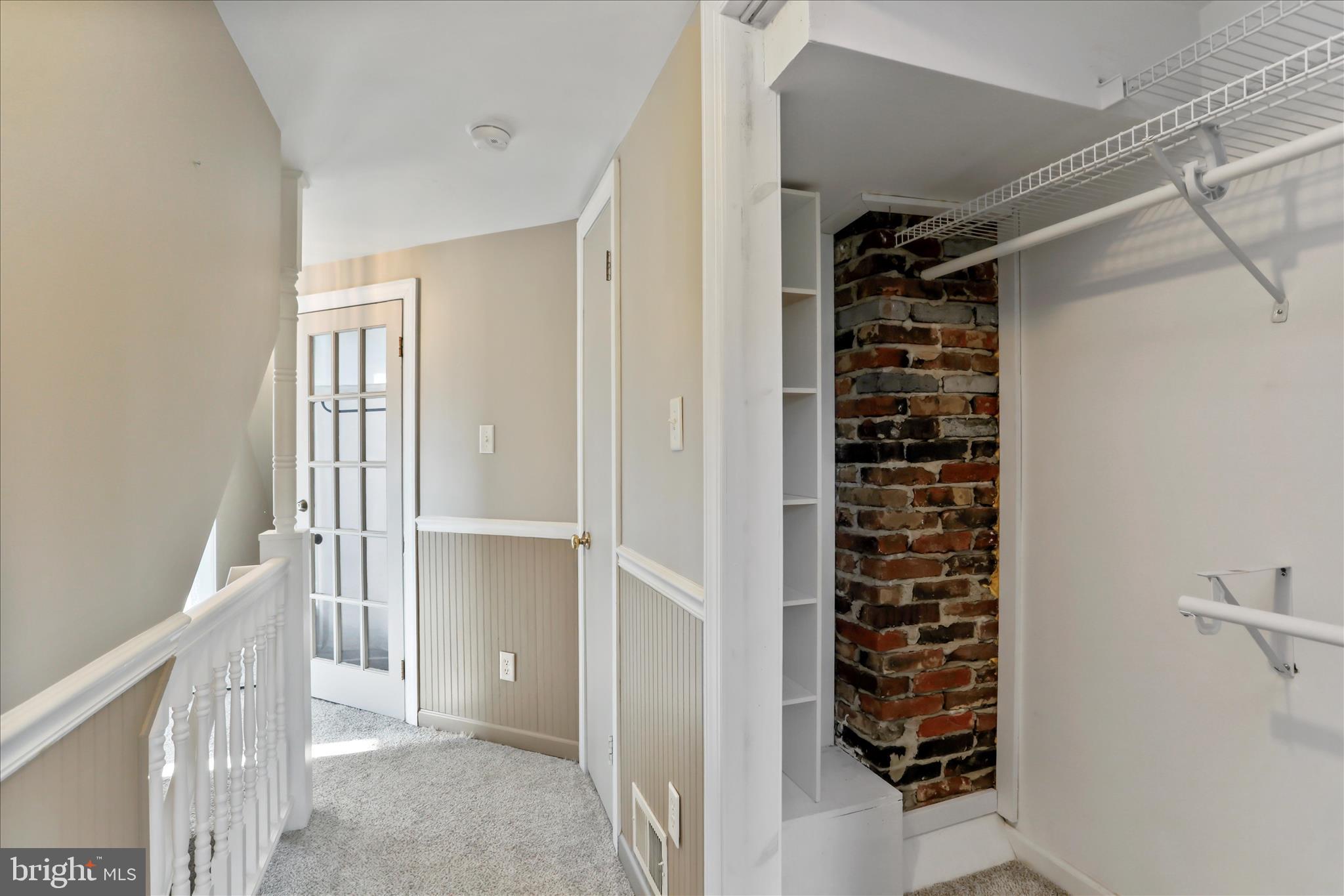 21938 Durberry Road Smithsburg, MD 21783 - Photo 27 of 55 a view of walk in closet with clothes and shoes