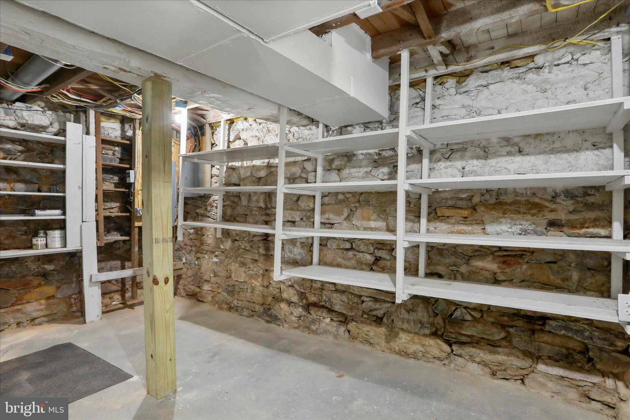 21938 Durberry Road Smithsburg, MD 21783 - Photo 37 of 55 a view of an empty room with wooden shelves