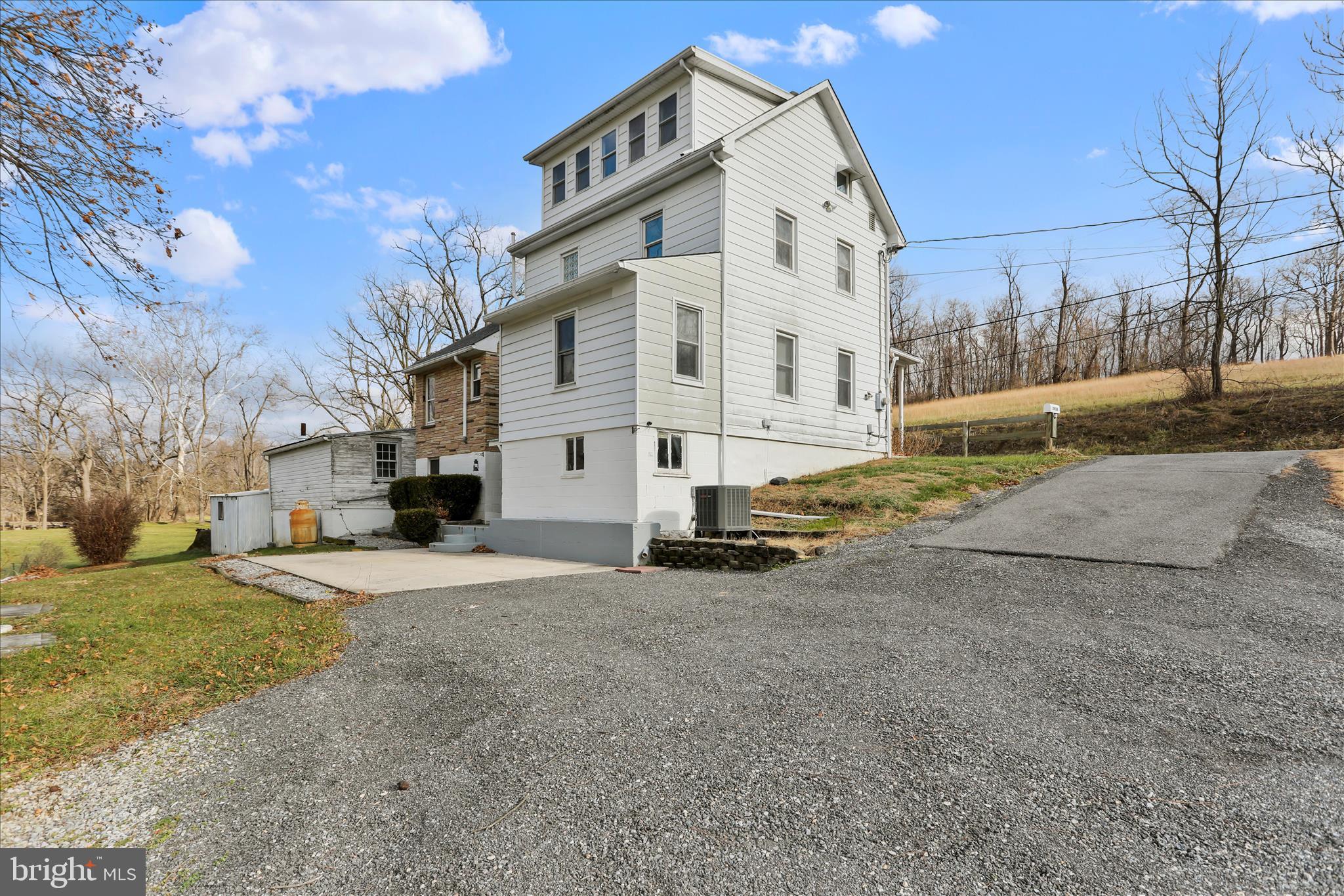 21938 Durberry Road Smithsburg, MD 21783 - Photo 41 of 55 a view of white house with a yard covered in snow