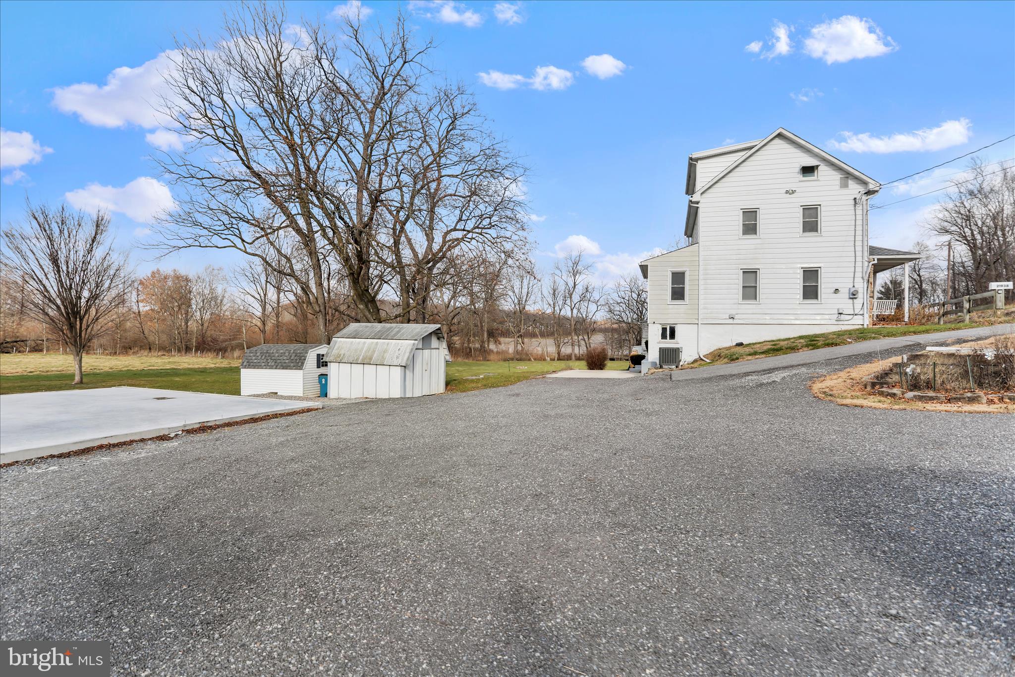 21938 Durberry Road Smithsburg, MD 21783 - Photo 43 of 55 a view of white house with a road and yard