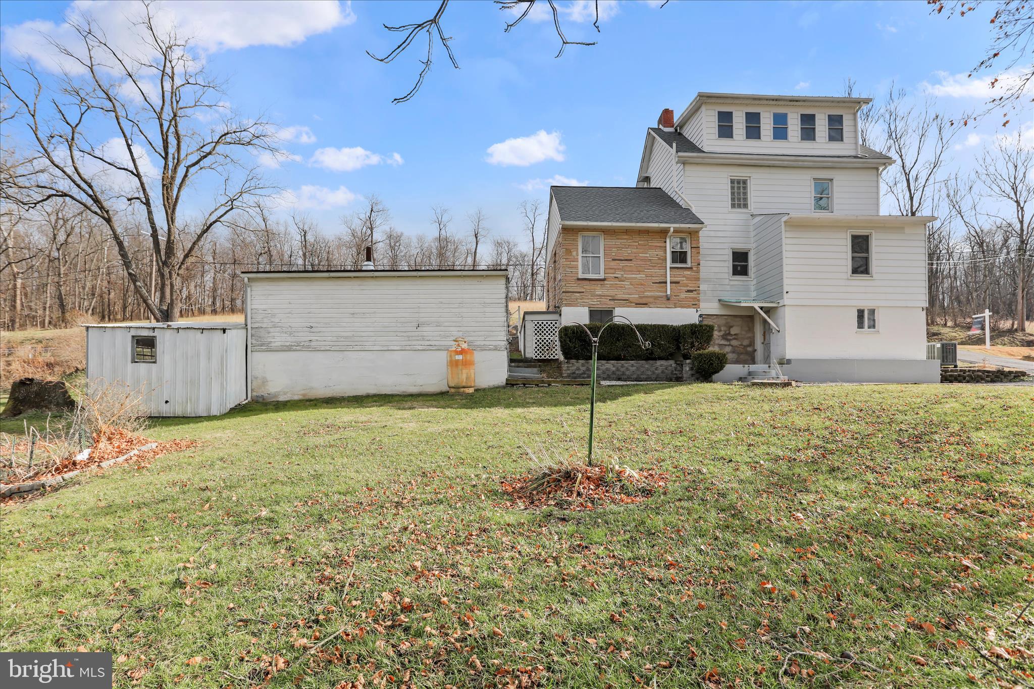 21938 Durberry Road Smithsburg, MD 21783 - Photo 45 of 55 a backyard of a house with lots of green space