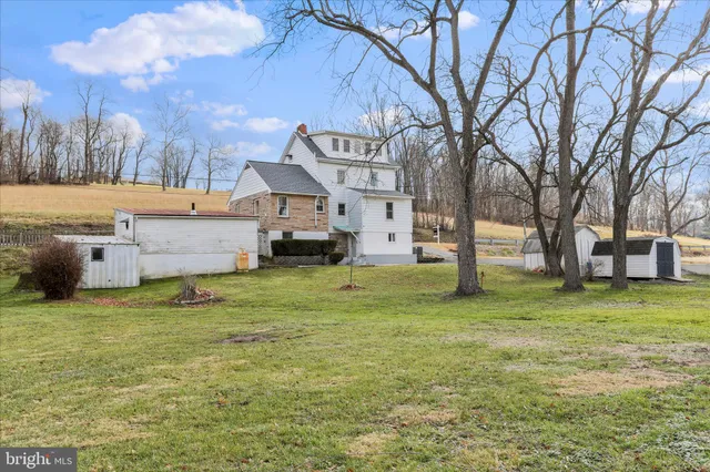 a view of a yard covered with snow