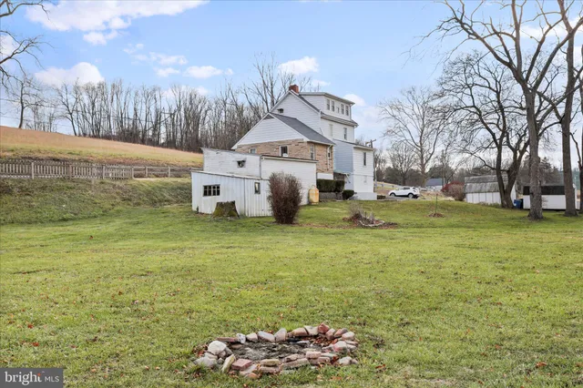 a view of street with small yard