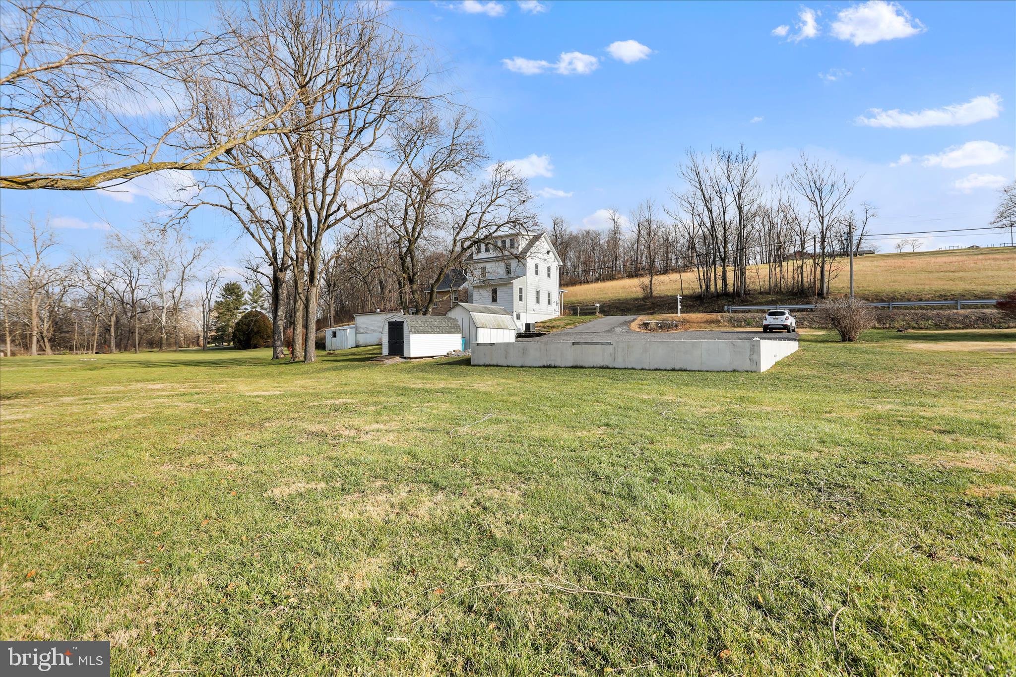 21938 Durberry Road Smithsburg, MD 21783 - Photo 55 of 55 a view of a swimming pool with an outdoor seating and a yard