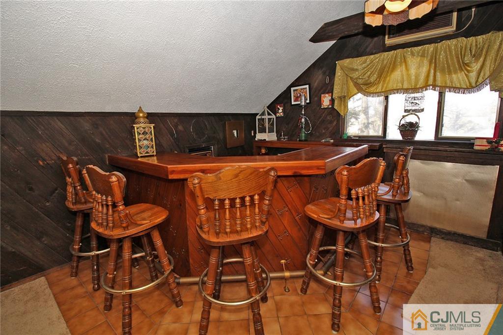 130 Ethel Road Edison, NJ 08817 - Photo 19 of 25 a dining room with furniture and a large window